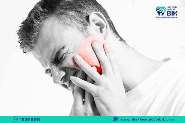 đau nhức hàm là triệu chứng mọc răng khôn