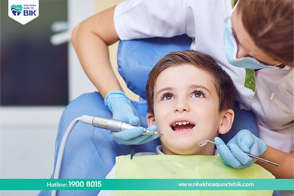 When should children be taken to the dentist?